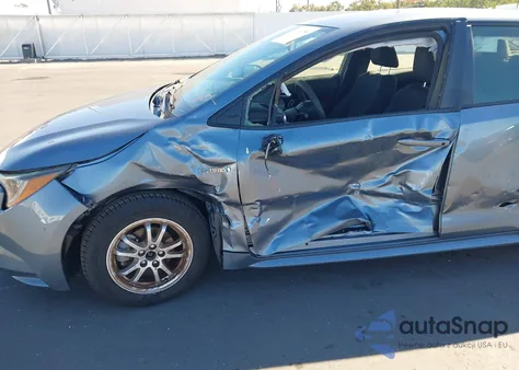 2021 Toyota Corolla Hybrid Le from USA, damaged, VIN JTDEAMDE5MJ003590